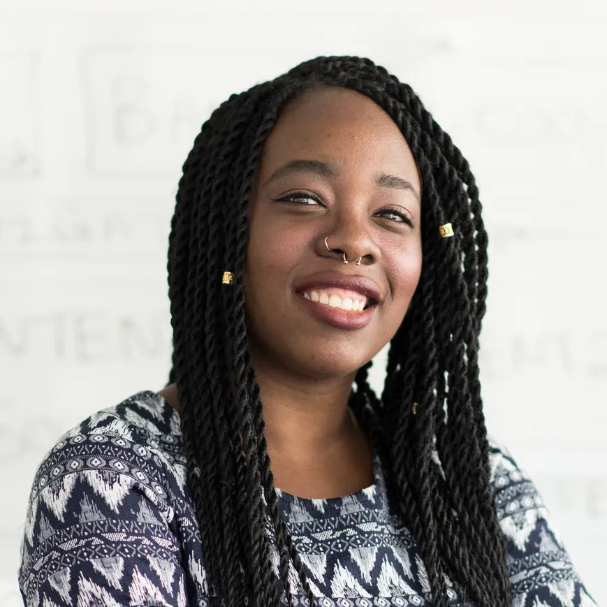 A headshot of Thalida